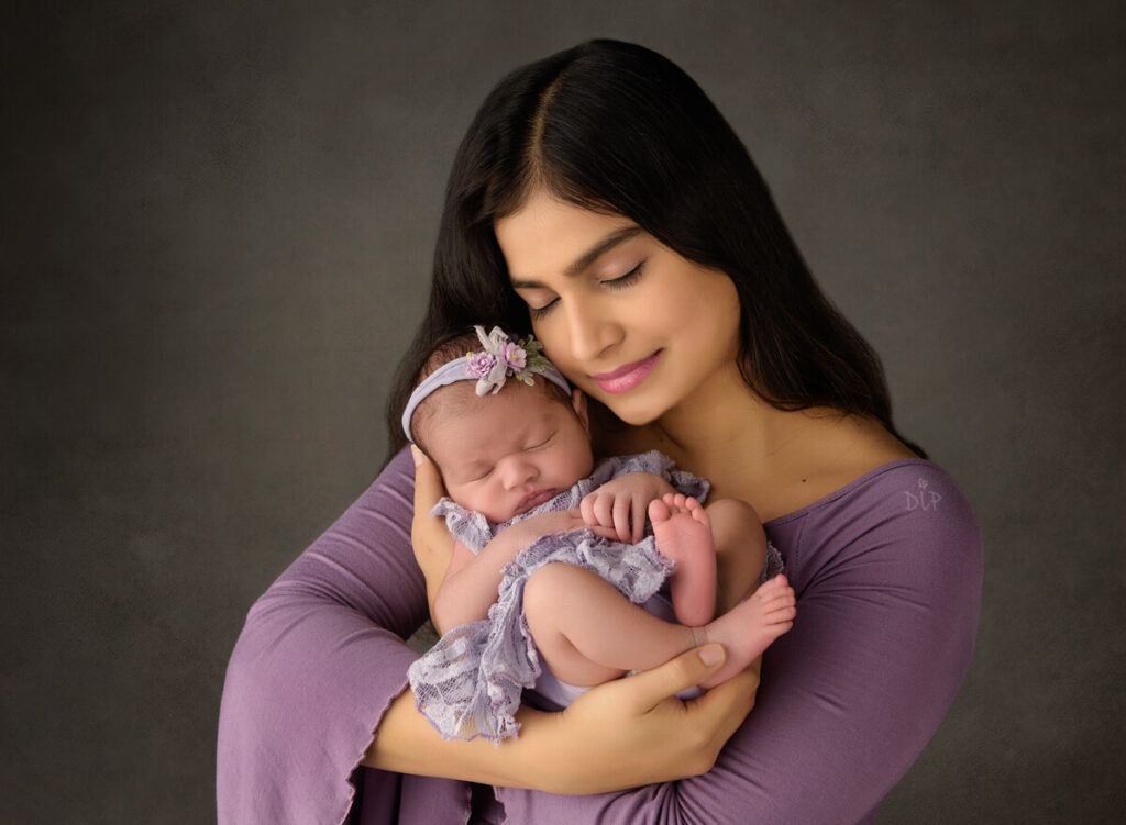 Post-baby tips mom holding newborn