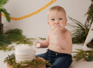 Experience Austin Baby Photography little boy eating cake