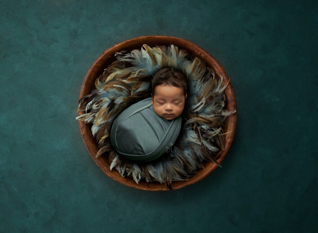 Austin Newborn Photographer baby boy wrapped in blue