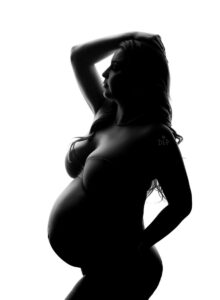 Austin Maternity Photographer silhouette of pregnant mom