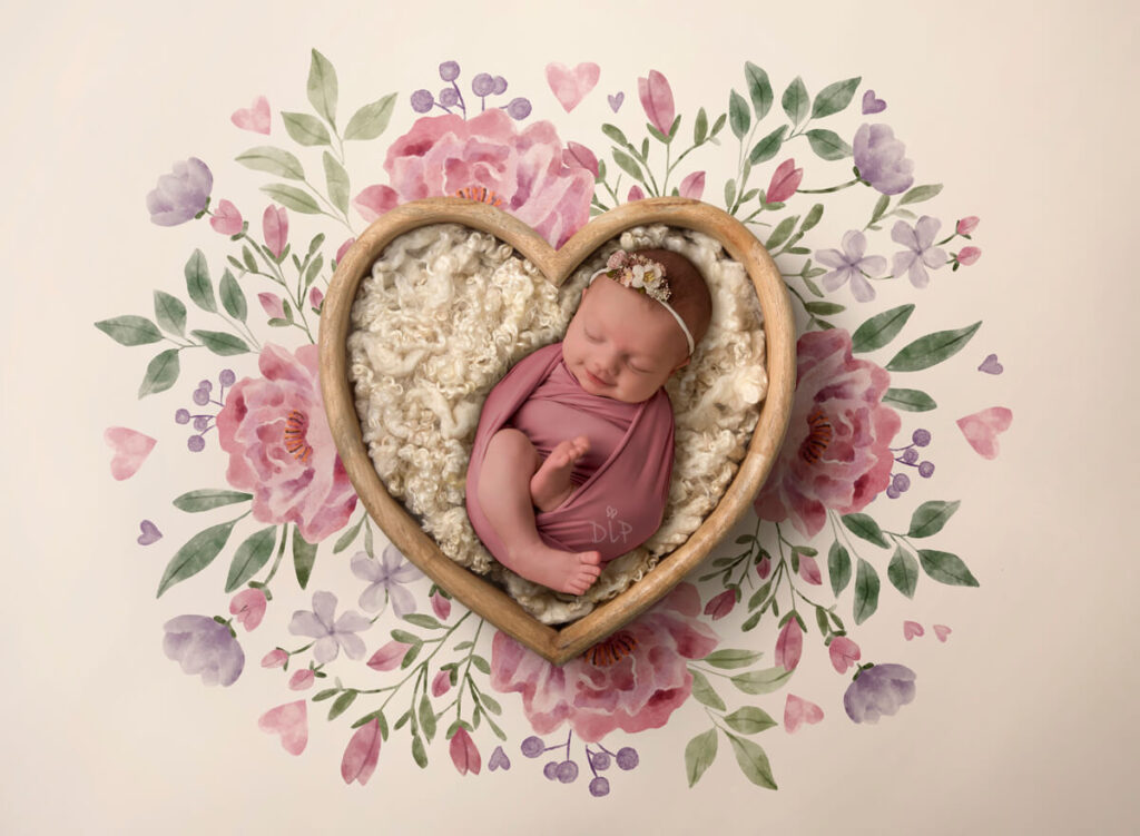 Austin Newborn Photographer baby girl in pink wrap in heart bowl with watercolor flower background