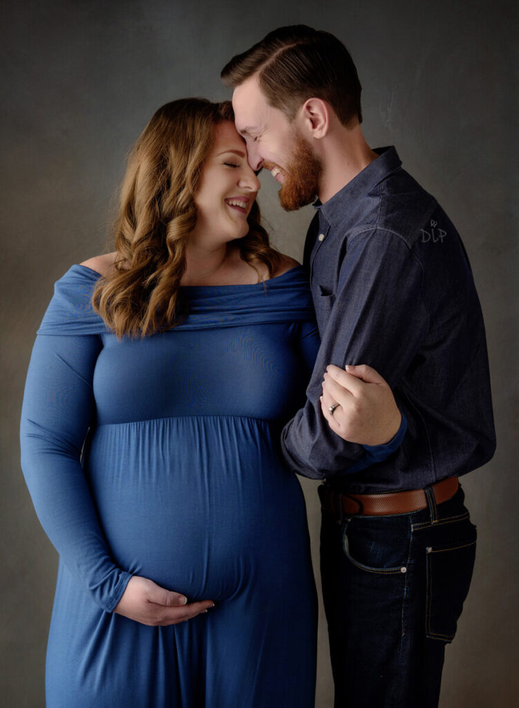 Austin Maternity Photographer expecting mom and dad laughing
