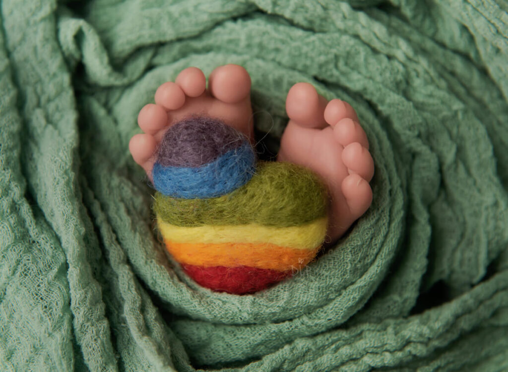 Austin Newborn Photographer baby feet holding heart