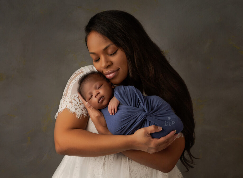 austin doulas Newborn photography mom holding baby boy